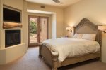 Bedroom 3 has a queen size bed with a gas fireplace and flat screen TV